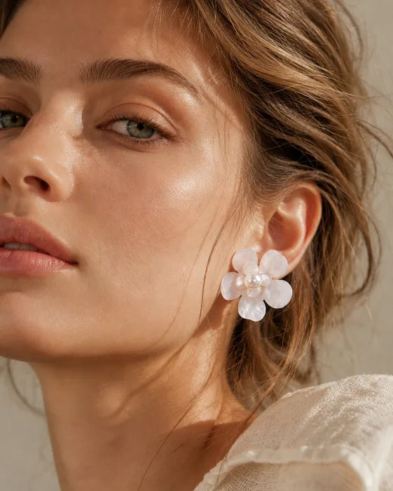 Detail view of Florielle Resin Flower Pearl Stud Earrings by Zodiglow