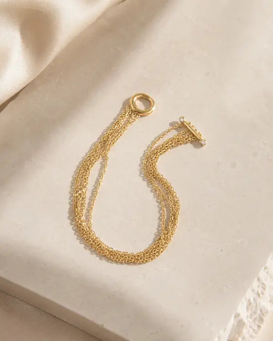 Detail view of Golden Cascade Toggle Bracelet by Zodiglow