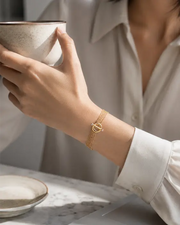 Side view of Golden Cascade Toggle Bracelet by Zodiglow
