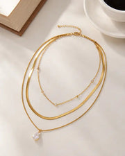 Detail view of Golden Raindrop Layered Necklace by Zodiglow