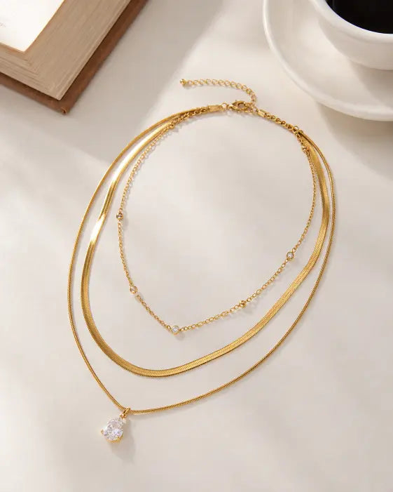 Detail view of Golden Raindrop Layered Necklace by Zodiglow