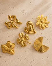 Detail view of Golden Muse Stud Earrings by Zodiglow