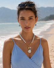 Side view of Laguna Shell Treasure Necklace by Zodiglow