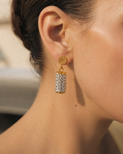 Side view of Lumière Gold Pavé Tassel Drop Earrings by Zodiglow