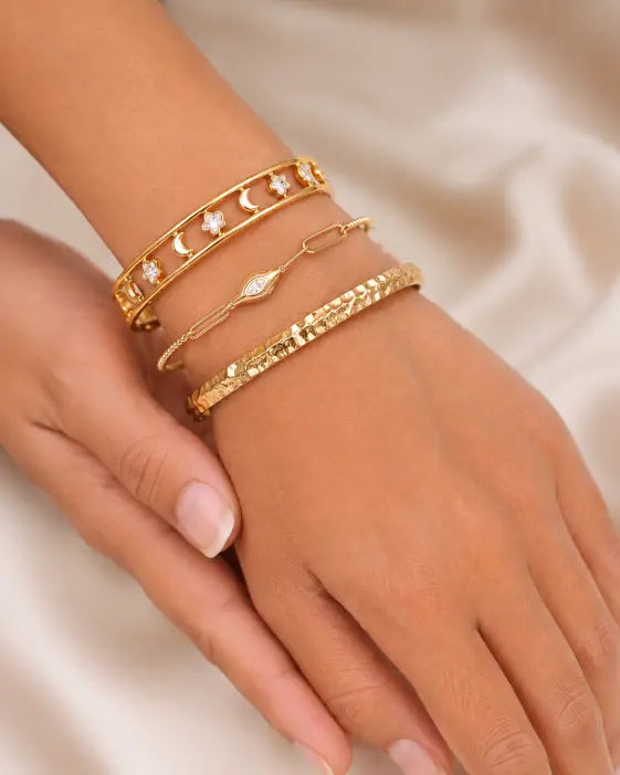 Close-up view of Luna Star Gold Cuff Bracelet by Zodiglow