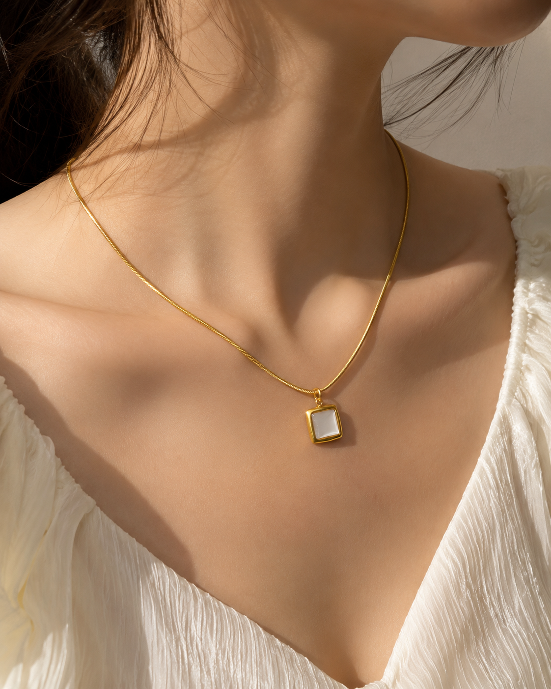 Detail view of Marina Square Shell Necklace by Zodiglow