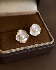 Detail view of Mariselle Freshwater Pearl Shell Stud Earrings by Zodiglow