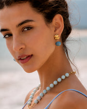 Detail view of Mira Blue Pebble Drop Earrings by Zodiglow