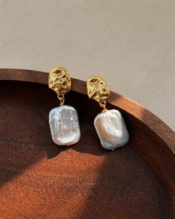 Detail view of Mira Sculpted Baroque Freshwater Pearl Drop Earrings by Zodiglow