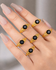 Close-up view of Noir Crest Ring by Zodiglow