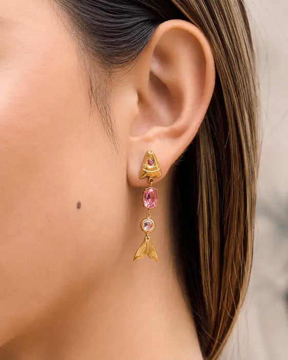 Close-up view of Sirena Fish Tail Earrings Collection by Zodiglow