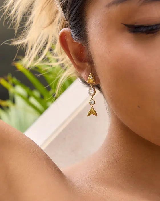 Detail view of Sirena Fish Tail Earrings Collection by Zodiglow