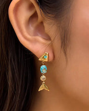 Side view of Sirena Fish Tail Earrings Collection by Zodiglow