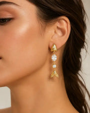 Styled view of Sirena Fish Tail Earrings Collection by Zodiglow