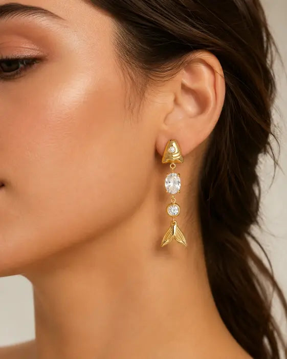 Styled view of Sirena Fish Tail Earrings Collection by Zodiglow
