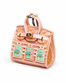 Front view of Surprise Mini Bag Charm by Zodiglow