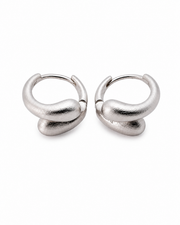 Front view of Sculpted Loop Huggie Hoops by Zodiglow