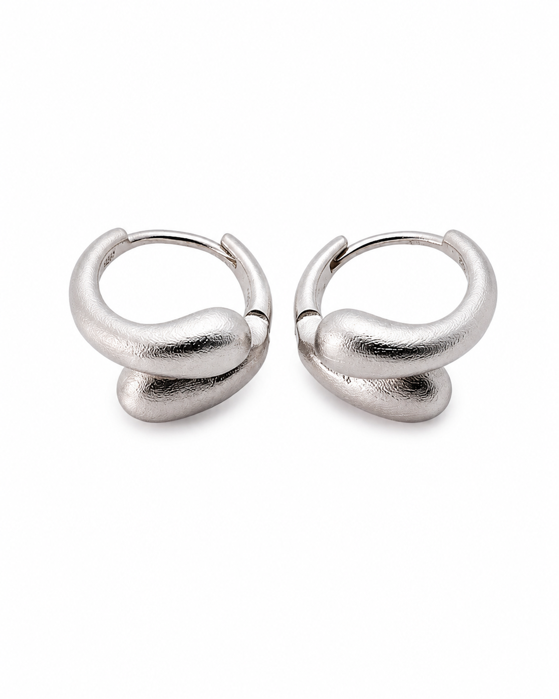 Front view of Sculpted Loop Huggie Hoops by Zodiglow