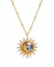 Front view of Solara Gold Sun Moon Necklace by Zodiglow