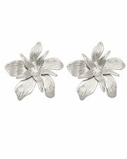 Side view of Solenne Sculptural Bloom Statement Earrings by Zodiglow