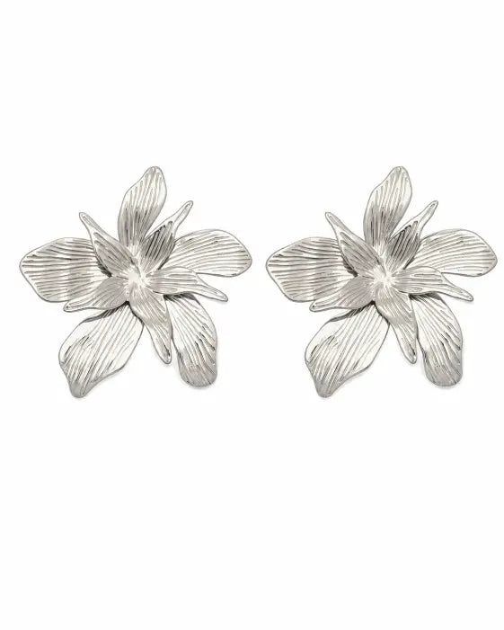 Side view of Solenne Sculptural Bloom Statement Earrings by Zodiglow