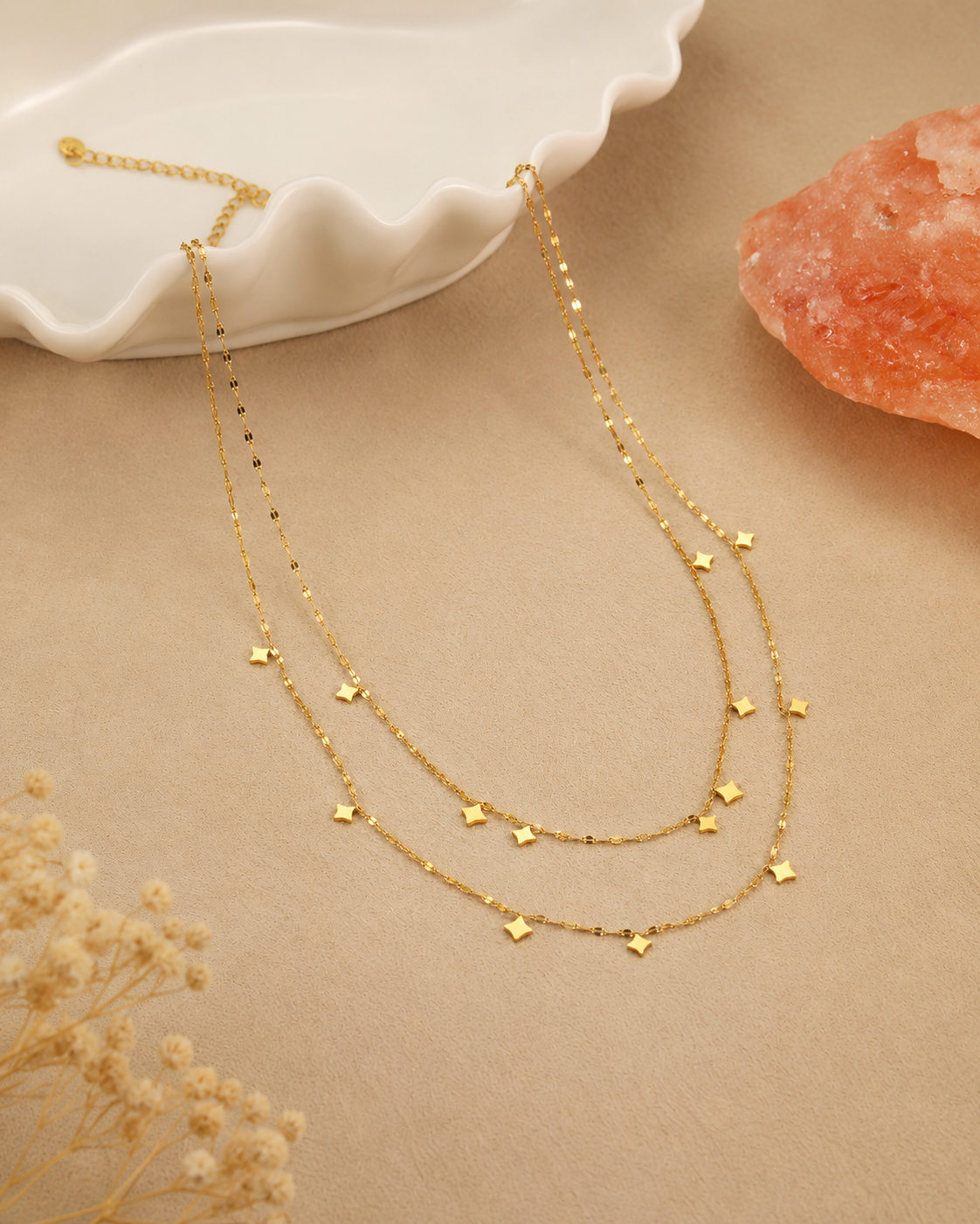 Side view of Stella Layered Star Necklace by Zodiglow