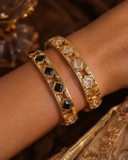 Detail view of Valeria Cubic Zirconia Clasp Bangle by Zodiglow
